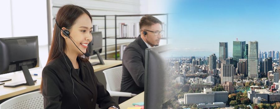 Business people wearing headset working in office to support remote customer or colleague. Call center, telemarketing, customer support agent provide service in broaden view .