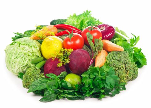 Healthy Eating. Seasonal organic raw vegetables. Isolated over white background