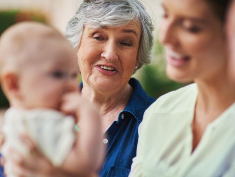 Cropped shot of a three generational family spending time outdoors.