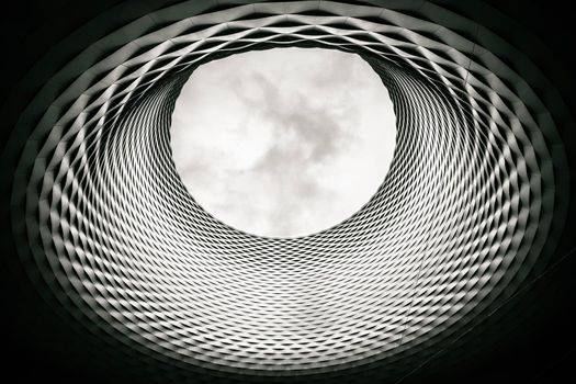 Basel Messe exhibition square aluminium panel facade hole black and white view, Switzerland 
