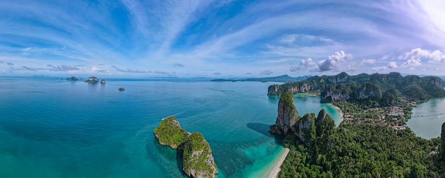 Railay Beach Krabi Thailand, the tropical beach of Railay Krabi, Drone aerial view of Panoramic view of idyllic Railay Beach in Thailand with a huge limestone rocks from above with drone