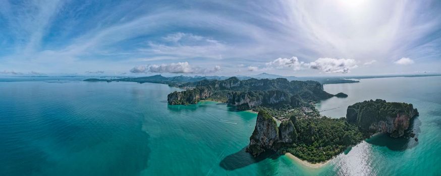 Railay Beach Krabi Thailand, the tropical beach of Railay Krabi, Drone aerial view of Panoramic view of idyllic Railay Beach in Thailand with a huge limestone rocks from above with drone