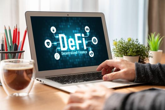 Decentralized finance or DeFi concept on modish computer screen . The defi system give new choice of investment and money saving .