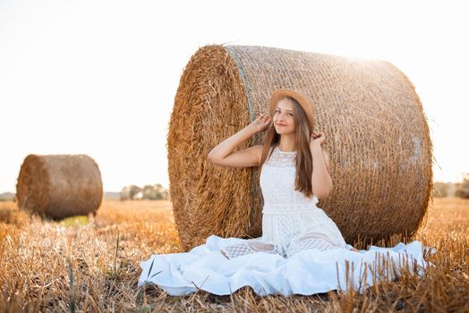 Portrait of a charming girl on nature background