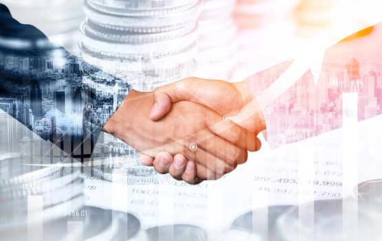 Business handshake on finance prosperity and money technology asset background . Economy and financial growth by investment in valuable stock market to gain wealth profit form currency trading