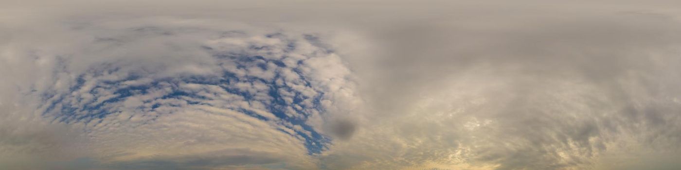 Sky panorama on overcast rainy day with low clouds in seamless spherical equirectangular format. Complete zenith for use in 3D graphics, game and for aerial drone 360 degree panorama as a sky dome.