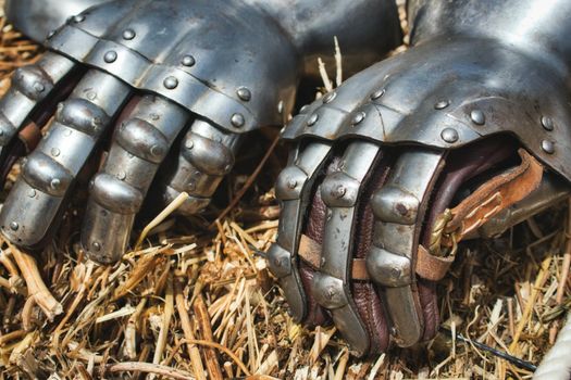 Close-up of a pair of knight's medieval gauntlets, part of a suit of armour