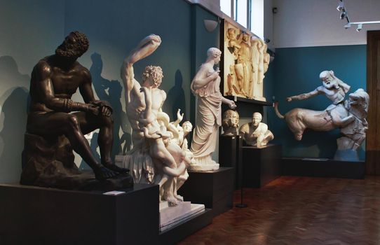 Oxford, UK - March 02 2020: Marble and bronze statues on display in the Ashmolean Museum in Oxford, England