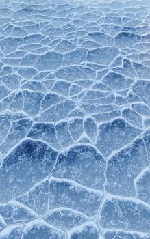 Ice ground with crack pattern, 3d rendering. Computer digital drawing.