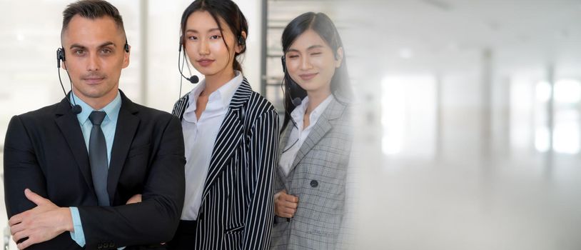 Business people wearing headset working in office to support remote customer or colleague. Call center, telemarketing, customer support agent provide service in broaden view .