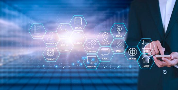 Hands of business man use mobile phone connect social media with internet. close up businessman working with smart phone in office with virtual icon diagram. Hands touch phone social media concept