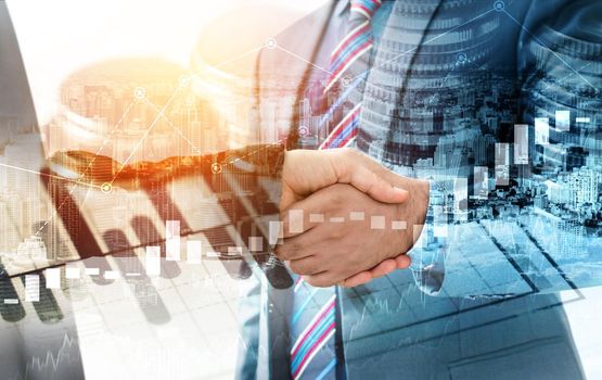 Business handshake on finance prosperity and money technology asset background . Economy and financial growth by investment in valuable stock market to gain wealth profit form currency trading