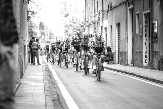 Imperia, IM, Liguria, Italy - March 20, 2022: An important cycling race in a small town in Italy in March. The name of the competition is Milano-Sanremo 2022