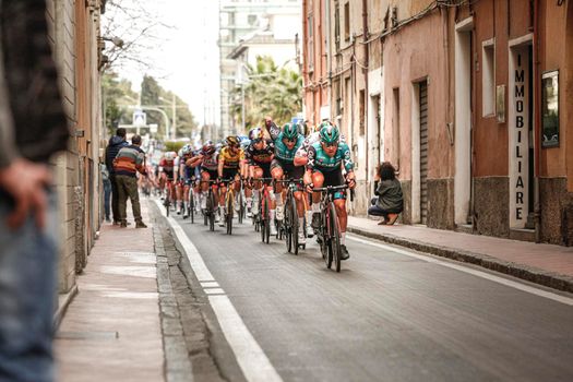 Imperia, IM, Liguria, Italy - March 20, 2022: An important cycling race in a small town in Italy in March. The name of the competition is Milano-Sanremo 2022