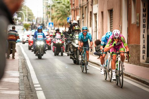 Imperia, IM, Liguria, Italy - March 20, 2022: An important cycling race in a small town in Italy in March. The name of the competition is Milano-Sanremo 2022