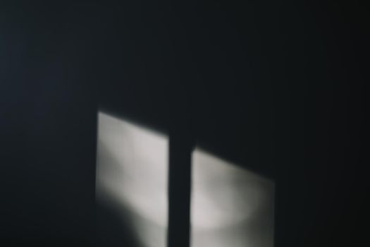 Abstract shadow and lights on white wall from window, monochrome, black and white Abstract shadow on the wall
