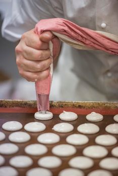 Making macarons.