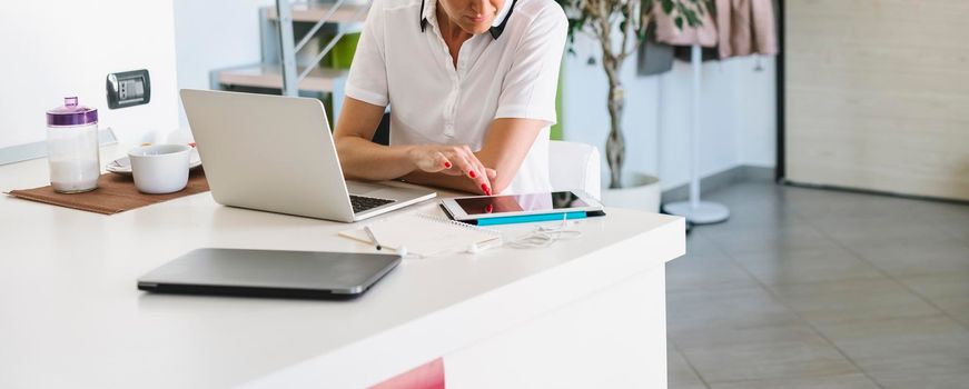 Businesswoman working from home.