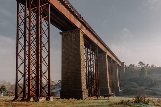 A 19th century viaduct in Taradale, Victoria, Australia on a clear spring day.