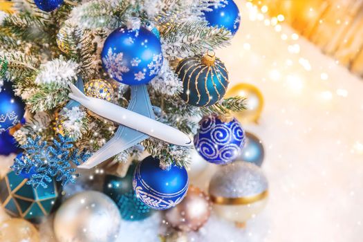 christmas background with airplane. travels. selective focus nature