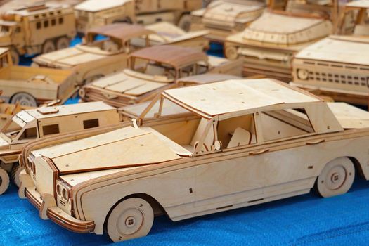 Wroclaw, Poland, August 25, 2021: wooden models of cars and other vehicles