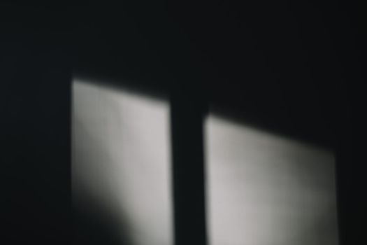 Abstract shadow and lights on white wall from window, monochrome, black and white Abstract shadow on the wall