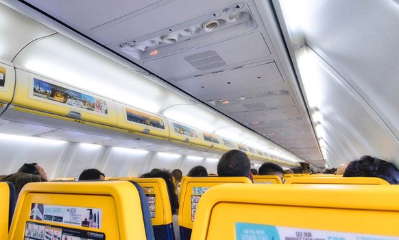 Interior of a Ryanair passenger plane full of people