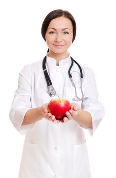 Female doctor holding apple, isolated on white background