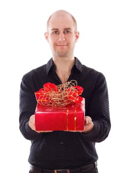 Picture of a young male holding a gift, isolated on white.