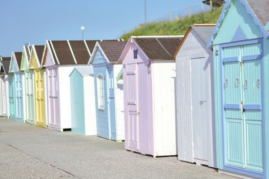 Colored wooden houses on the ocean coast bathing cabins at Saint aubin sur mer