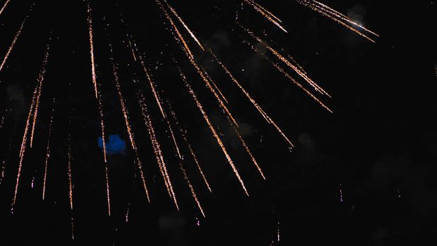 Elements of an explosion of fireworks in the night sky