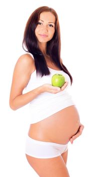 Pregnant woman holdting apple, isolated on white.