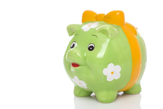 Green piggy bank, isolated on white background