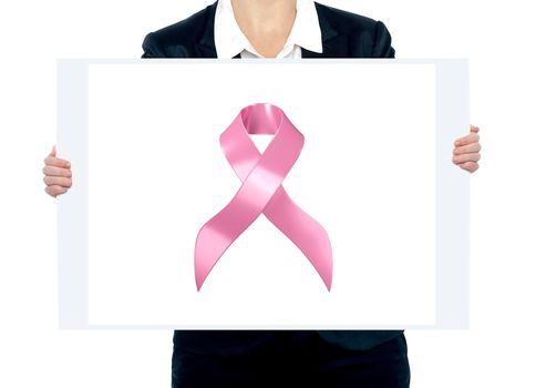 Close-up of a female holding a clipboard with pink ribbon for Breast Cancer Awareness Background. Clipping path.