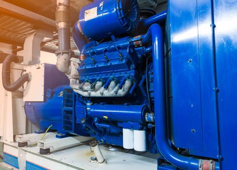 Close up Blue color of diesel generator and fuel filter system in factory.