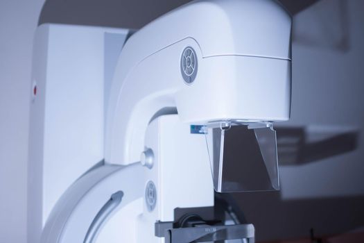 Mammography machine for breast screening device in hospital.