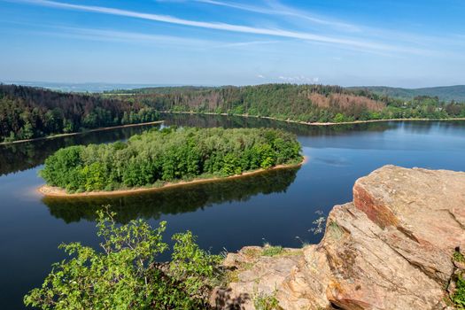 Lake and island with trees. Water reservoir Sec, Czech Republic, Europe