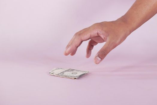 hand pick a one dollar cash ,