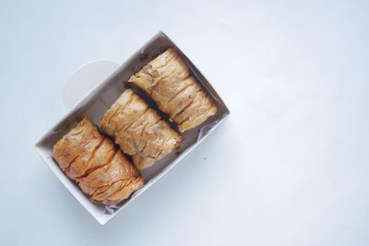 arabic dessert baklava on a white background .