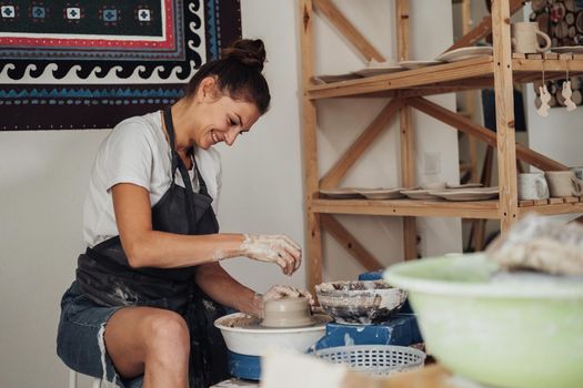 Female Pottery Master at Work in Her Clay Studio, Young Entrepreneur Woman Happy Owner of Small Business