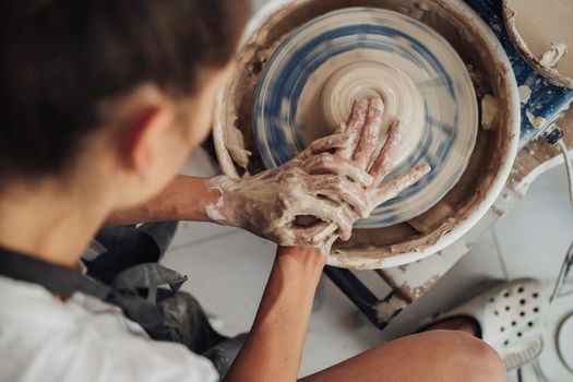 Flat Lay of Female Pottery Master at Work in Clay Studio, Handmade Process of Creating Pot on Wheel