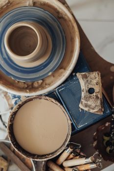 Top Down View on Pottery Workplace, Pot on Clay Wheel, Potter Master Accessories