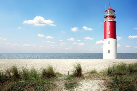 Beautiful summer seascape with lighthouse and sky