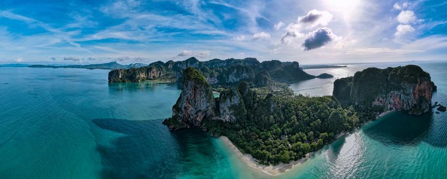 Railay Beach Krabi Thailand, the tropical beach of Railay Krabi, panoramic view of idyllic Railay Beach in Thailand with a huge limestone rocks