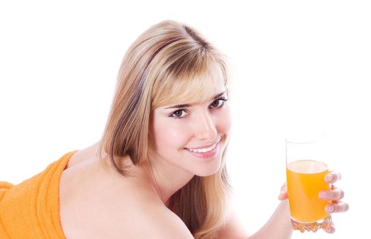 Beautiful woman after bath with orange juice isolated on white