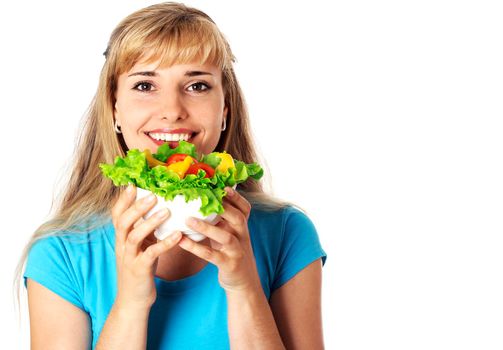 Happy young woman holding boul of salad and smiling big, isolated on white.