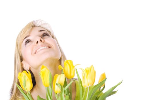 Smiling woman with bouquet of tulips on isolated white