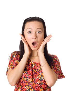 Close-up of a young woman looking surprised on white background