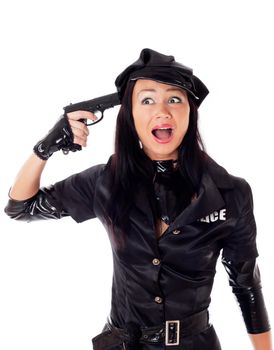 Portret of beautiful sexy policewoman committing suicide with gun in a black uniform. Isolated on white.