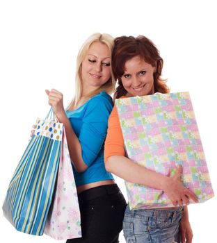 Happy ladies with shopping bags, isolated on white.